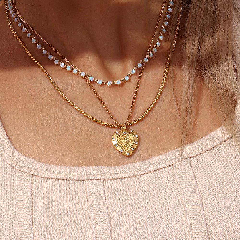 Euphemia - collar de corazón de oro con circonitas